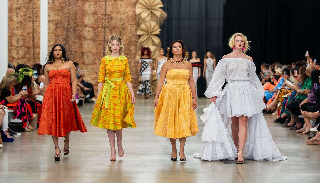 Models walk down the runway at the first Utah Pacific Fashion Show at the Utah State Fair Park on Saturday.