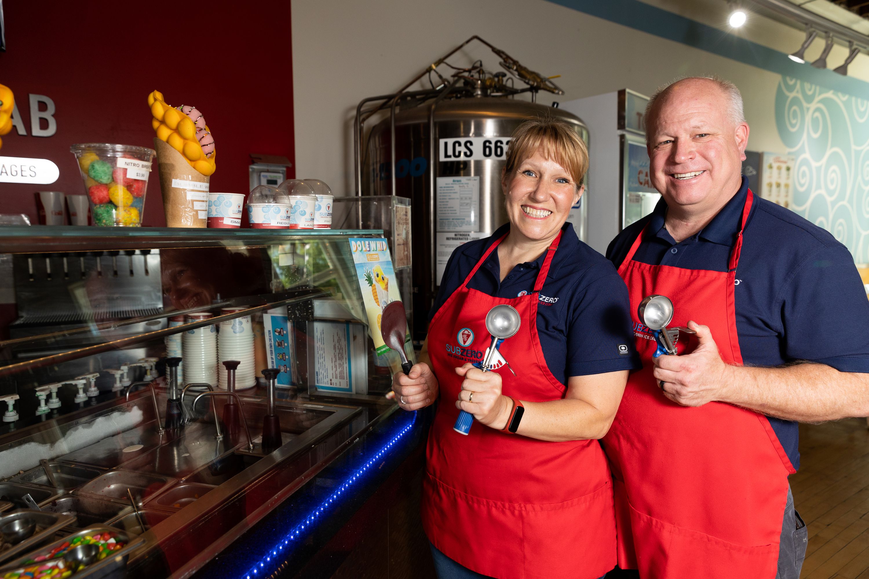 Naomi and Jerry Hancock, founders of Sub Zero Nitrogen Ice Cream, pose in their Provo location on July 10.