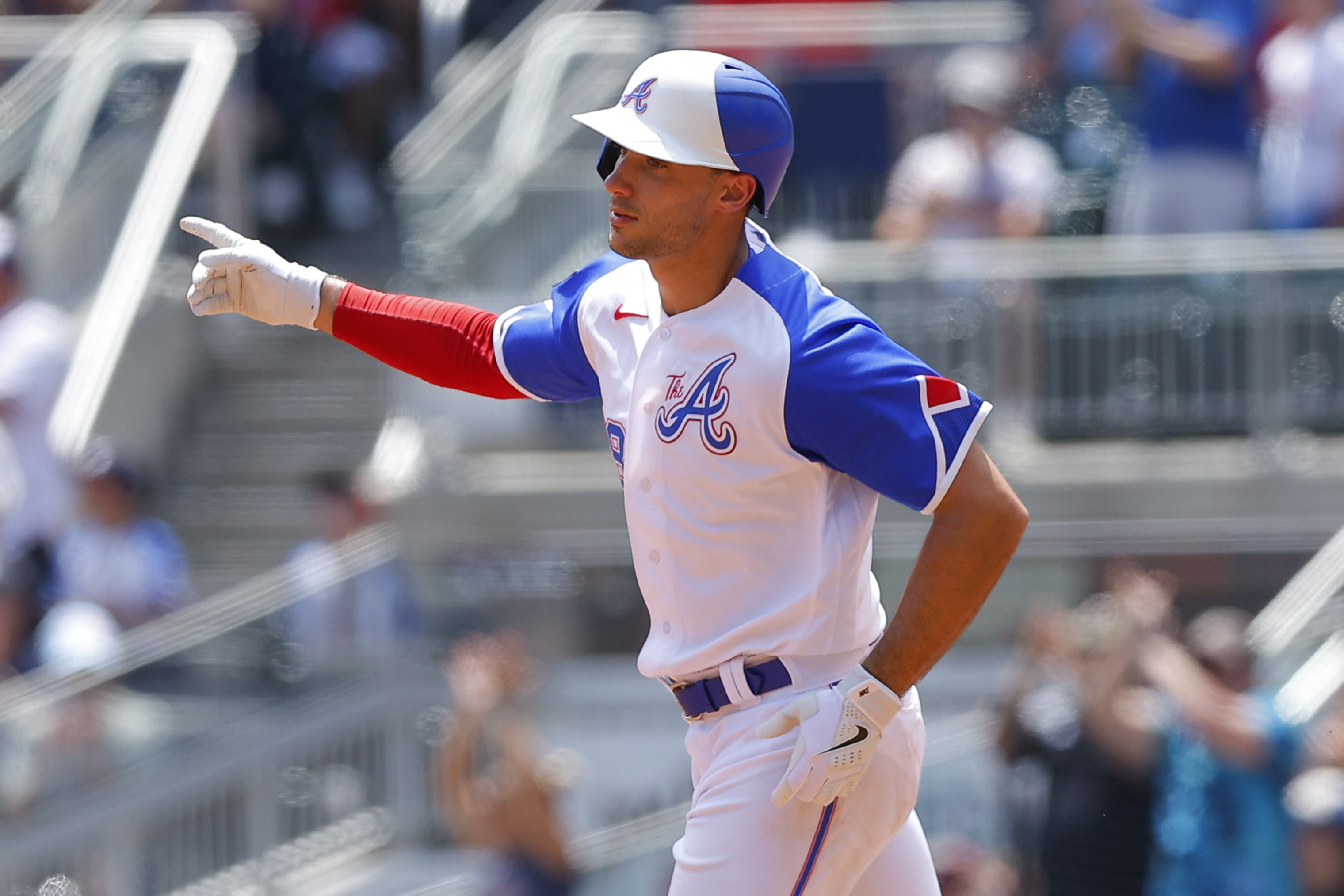 Atlanta Braves' Matt Olson reacts following a three-run home run during the third inning of a baseball game against the Milwaukee Brewers, Sunday, July 30, 2023, in Atlanta. 