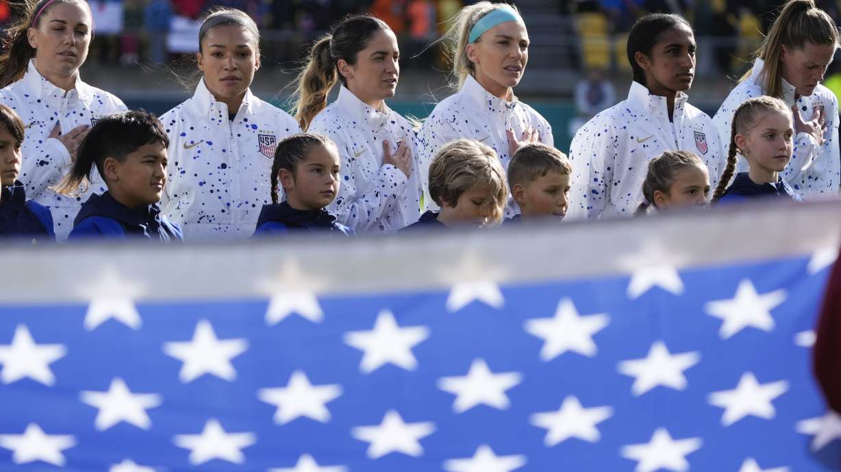 U.S. team sing their national anthem ahead of play in the Women's World Cup Group E soccer match between the United States and the Netherlands in Wellington, New Zealand, Thursday, July 27, 2023.