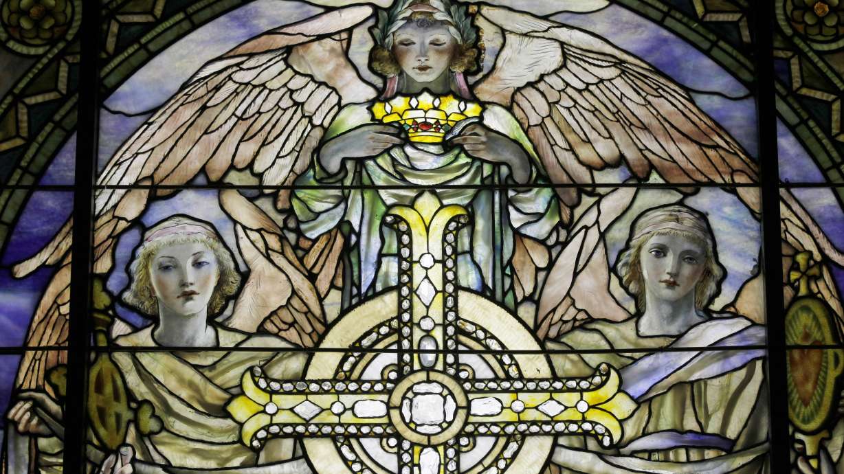 "The Righteous Shall Receive a Crown of Glory" Brainard Memorial Window for Methodist Church, Waterville, New York, c. 1901, is photographed while on display. About seven in 10 U.S. adults say they believe in angels, according to a new poll.