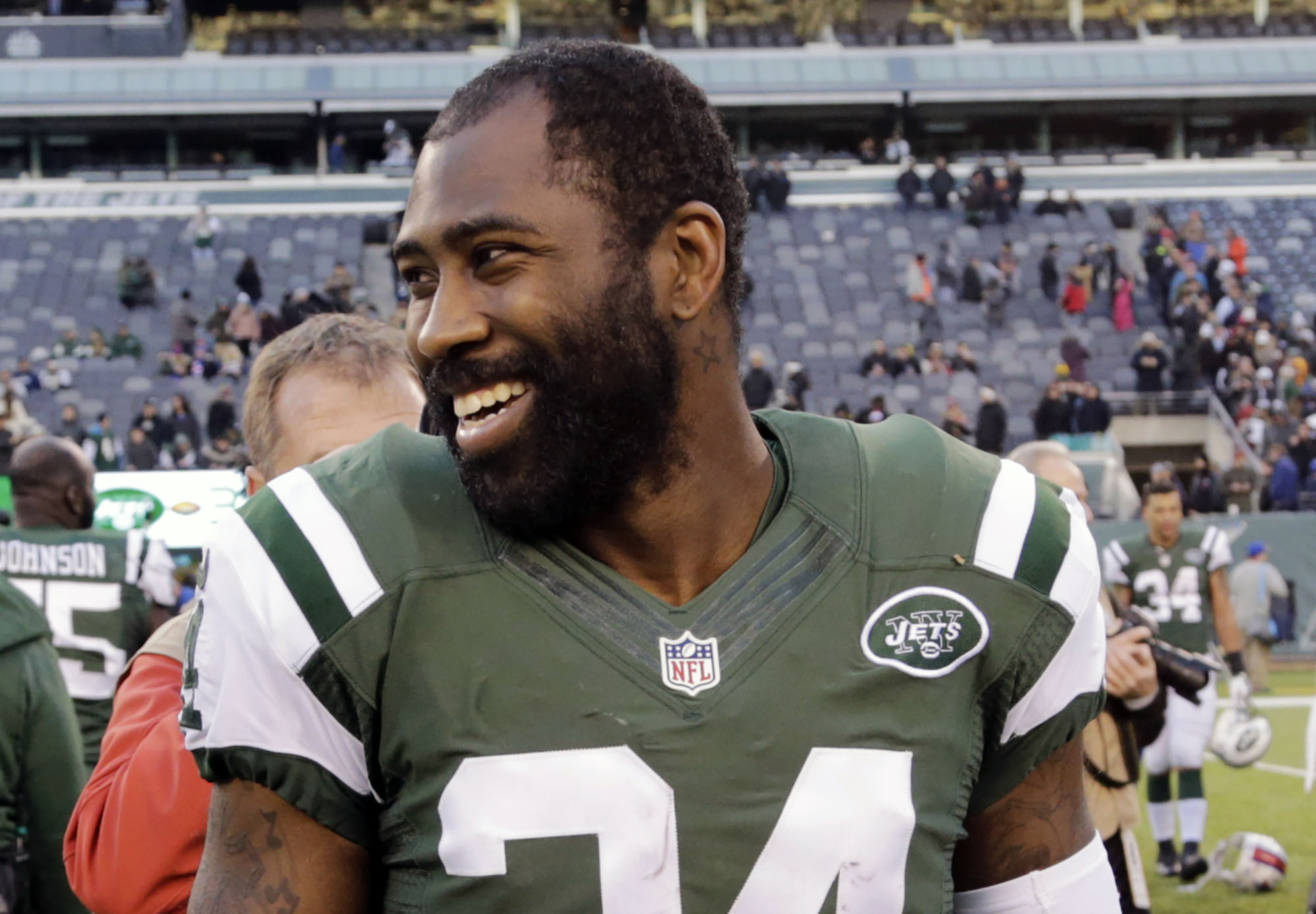 FILE - New York Jets cornerback Darrelle Revis walks on the field after an NFL football game against the Buffalo Bills in East Rutherford, N.J., Jan. 1, 2017. Revis is in the conversation about greatest cornerbacks in NFL history especially after his 2009 season during which he shut down the likes of Randy Moss, Chad Johnson, Andre Johnson, Steve Smith, Terrell Owens, Reggie Wayne and Roddy White.