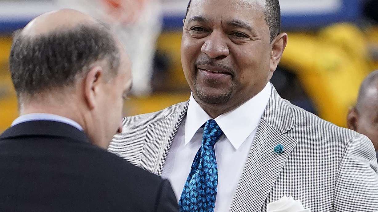 FILE - NBA analyst Mark Jackson, right, talks with Jeff Van Gundy, left, and others before Game 4 of basketball's NBA Finals between the Golden State Warriors and the Toronto Raptors in Oakland, Calif., June 7, 2019. Add Jackson to the long list of ESPN reporters and commentators who have been laid off over the past five weeks. Jackson was let go on Monday, July 31, 2023, with two years remaining on his contract.