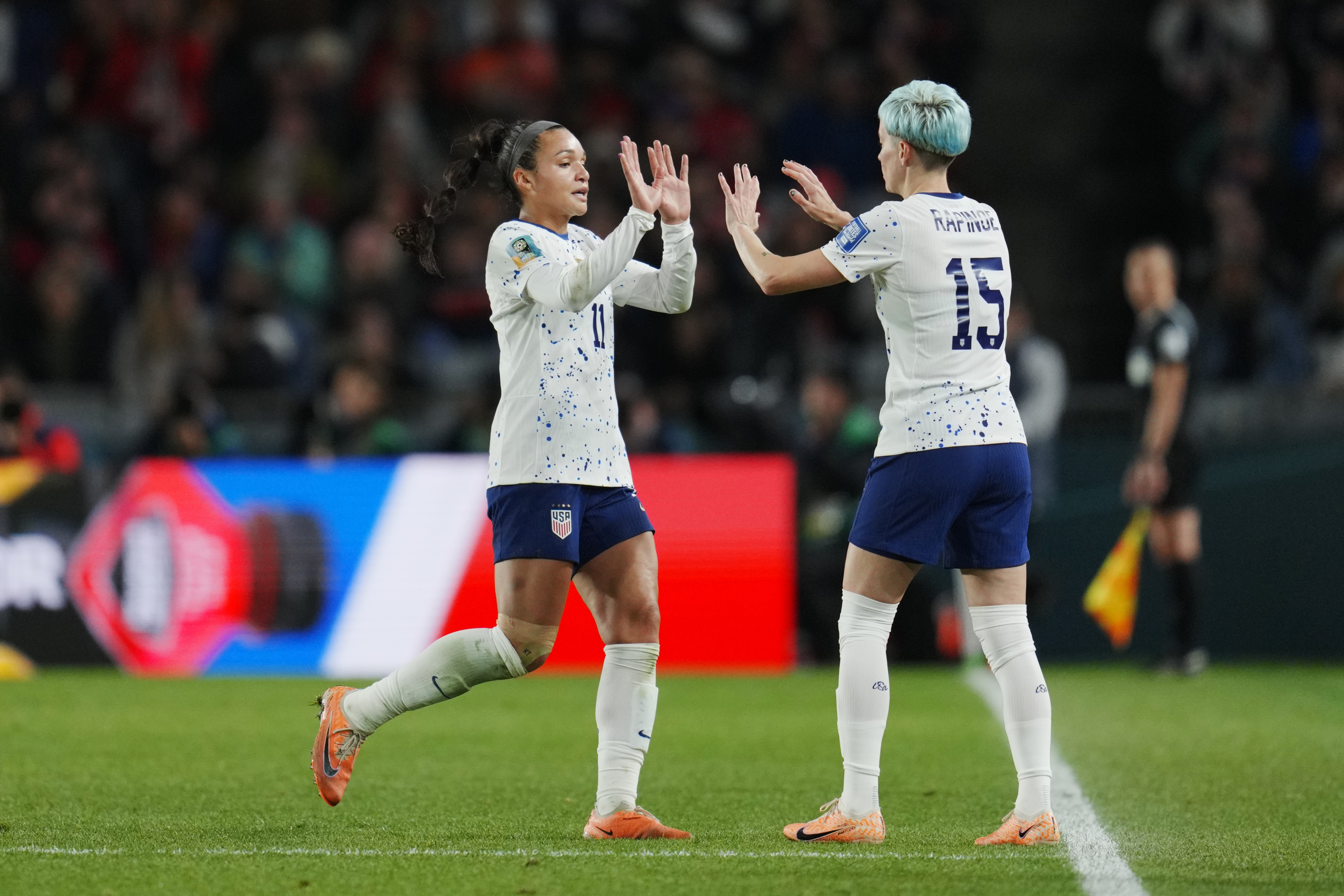 United States' Sophia Smith, left, is replaced by Megan Rapinoe during the second half of the FIFA Women's World Cup Group E soccer match between Portugal and the United States at Eden Park in Auckland, New Zealand, Tuesday, Aug. 1, 2023. 