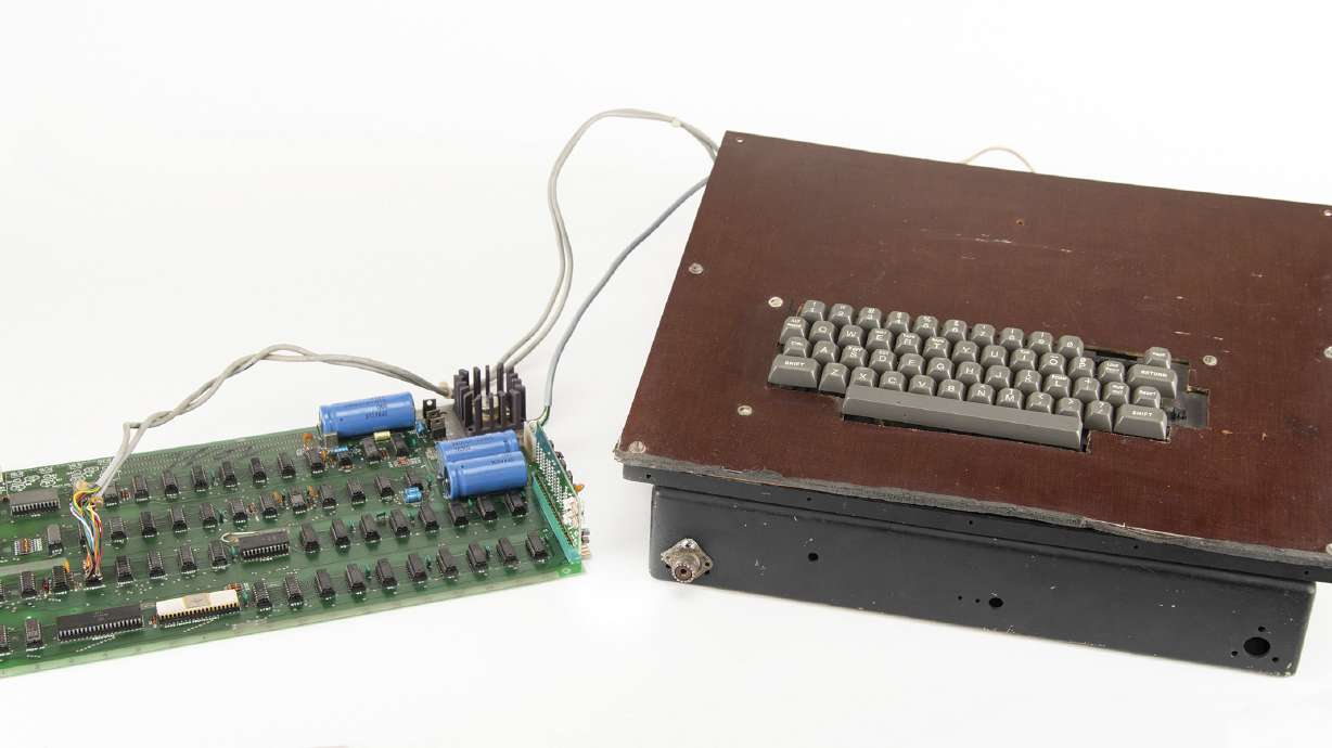 This photo shows a vintage Apple computer built in the 1970s and signed by company co-founder Steve Wozniak. The Apple-1 is being sold at auction in Boston.