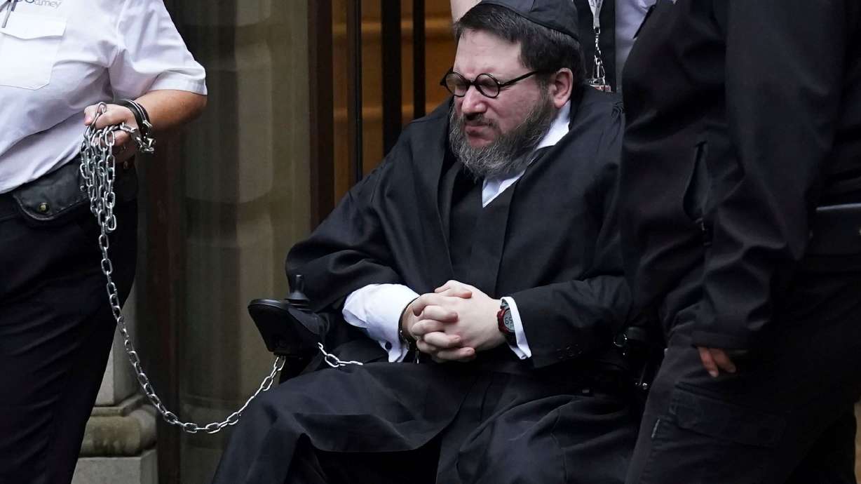 Nicholas Rossi, who has been accused of faking his own death, in Scotland before his extradition to the United States. He refused to show up to court for a second time on Friday.