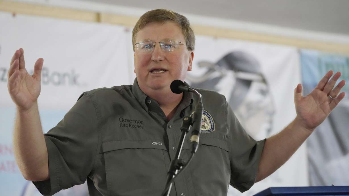 Mississippi Republican Gov. Tate Reeves addresses the crowd at the Neshoba County Fair in Philadelphia, Miss., Thursday, July 27, 2023. Reeves faces two opponents in the party primary Aug. 8, as he seeks reelection.