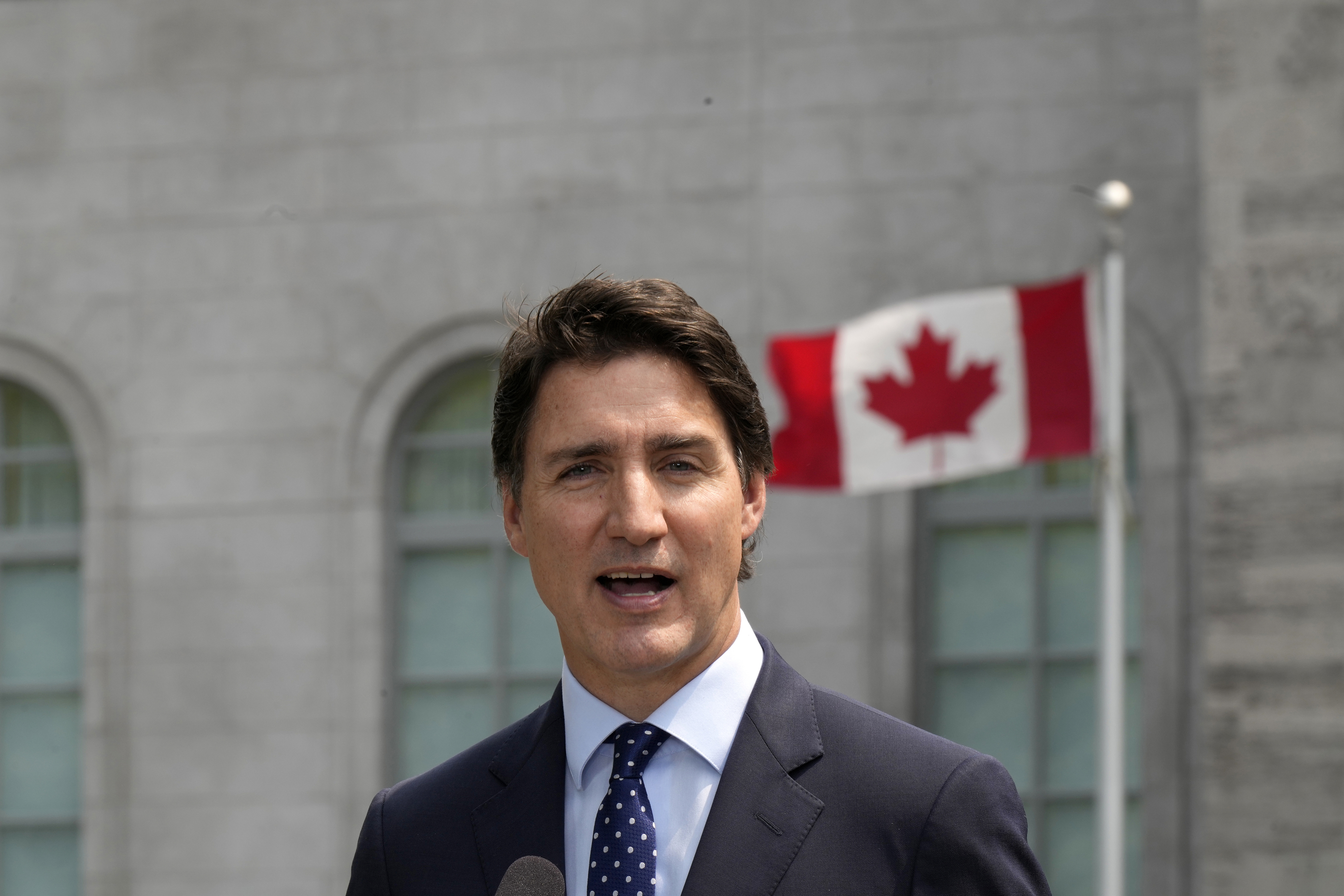 Prime Minister Justin Trudeau speaks to the media following a cabinet swearing-in ceremony at Rideau Hall in Ottawa on July 26. After 18 years of marriage, Trudeau and his wife are separating.