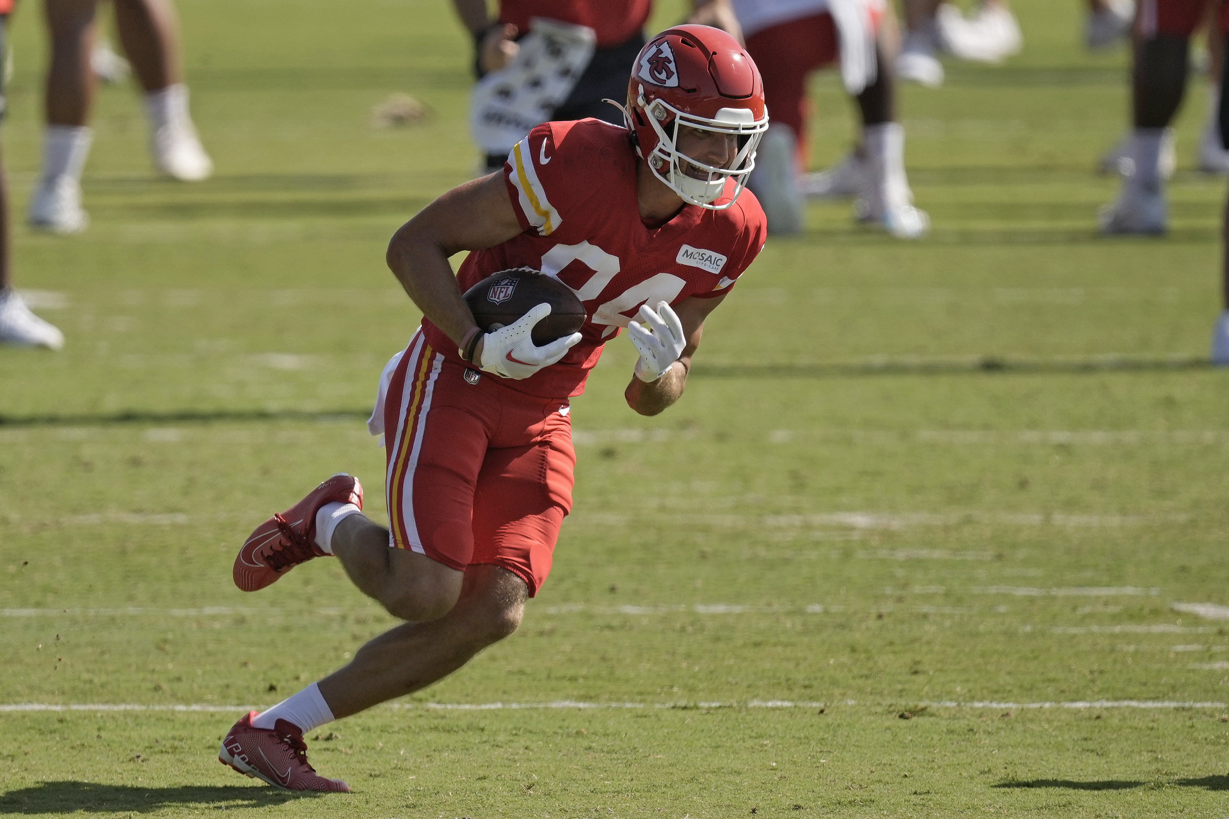 Kansas City Chiefs wide receiver Justin Watson runs the ball at NFL football training camp Friday, July 28, 2023, in St. Joseph, Mo.