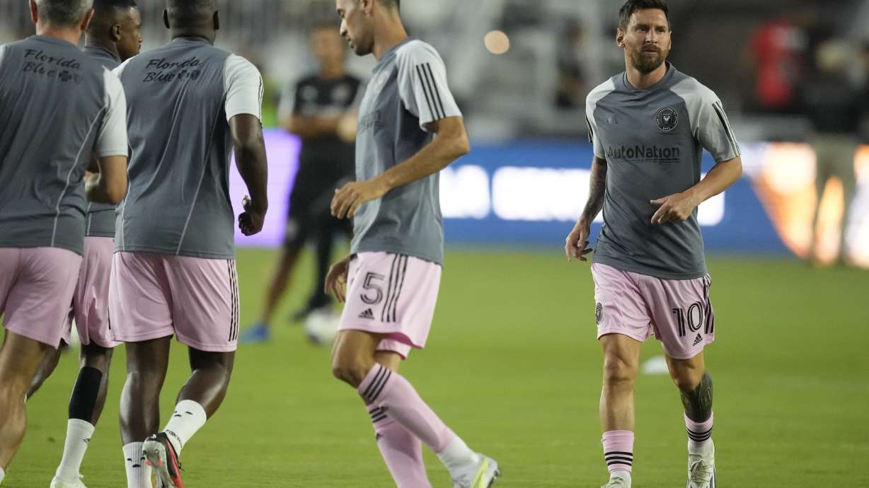Inter Miami forward Lionel Messi (10) and teammates and teammates warm up for a Leagues Cup soccer match against Orlando City, Wednesday, Aug. 2, 2023, in Fort Lauderdale, Fla.