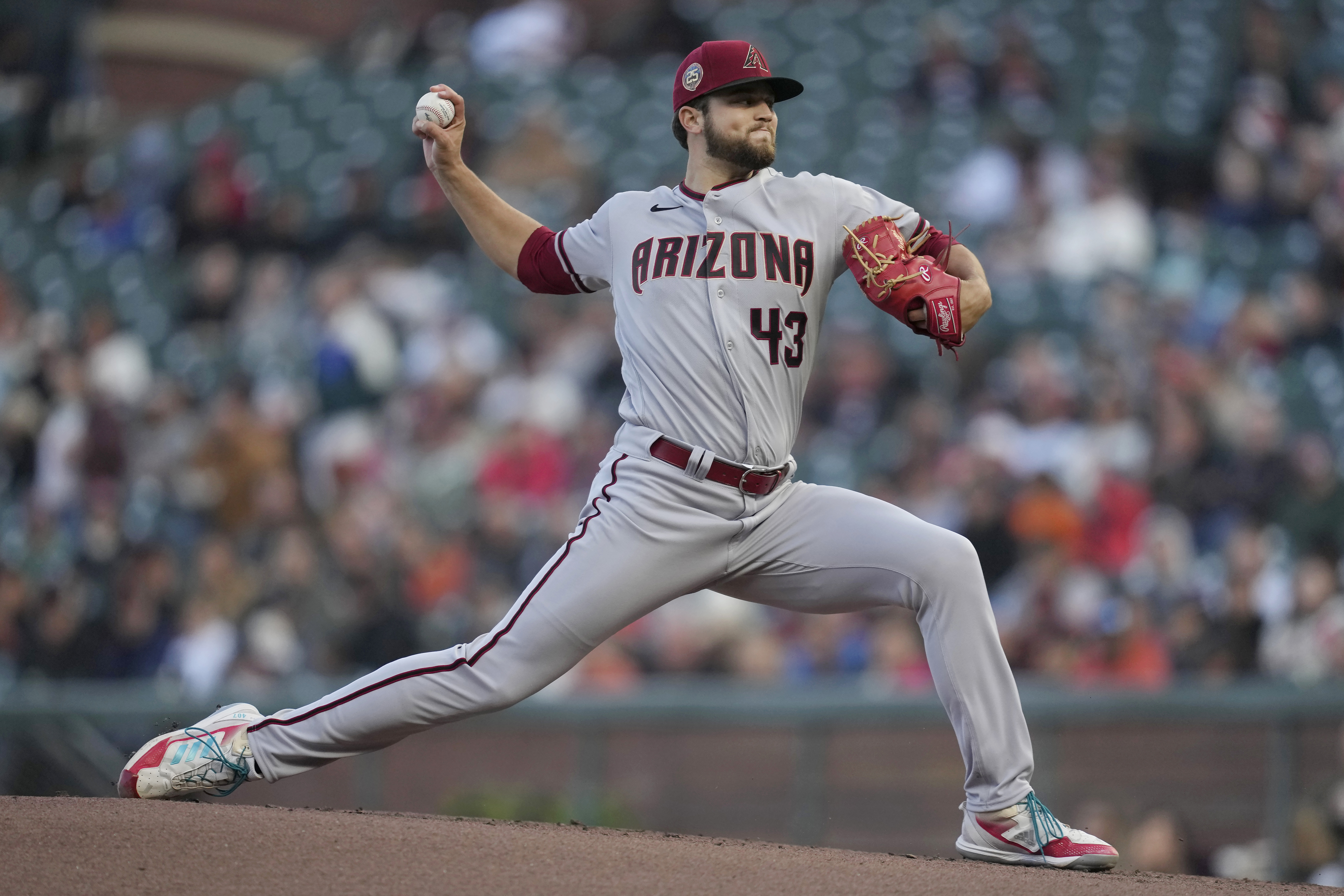 Arizona Diamondbacks pitcher Slade Cecconi works against the San Francisco Giants during the first inning of a baseball game in San Francisco, Wednesday, Aug. 2, 2023. 