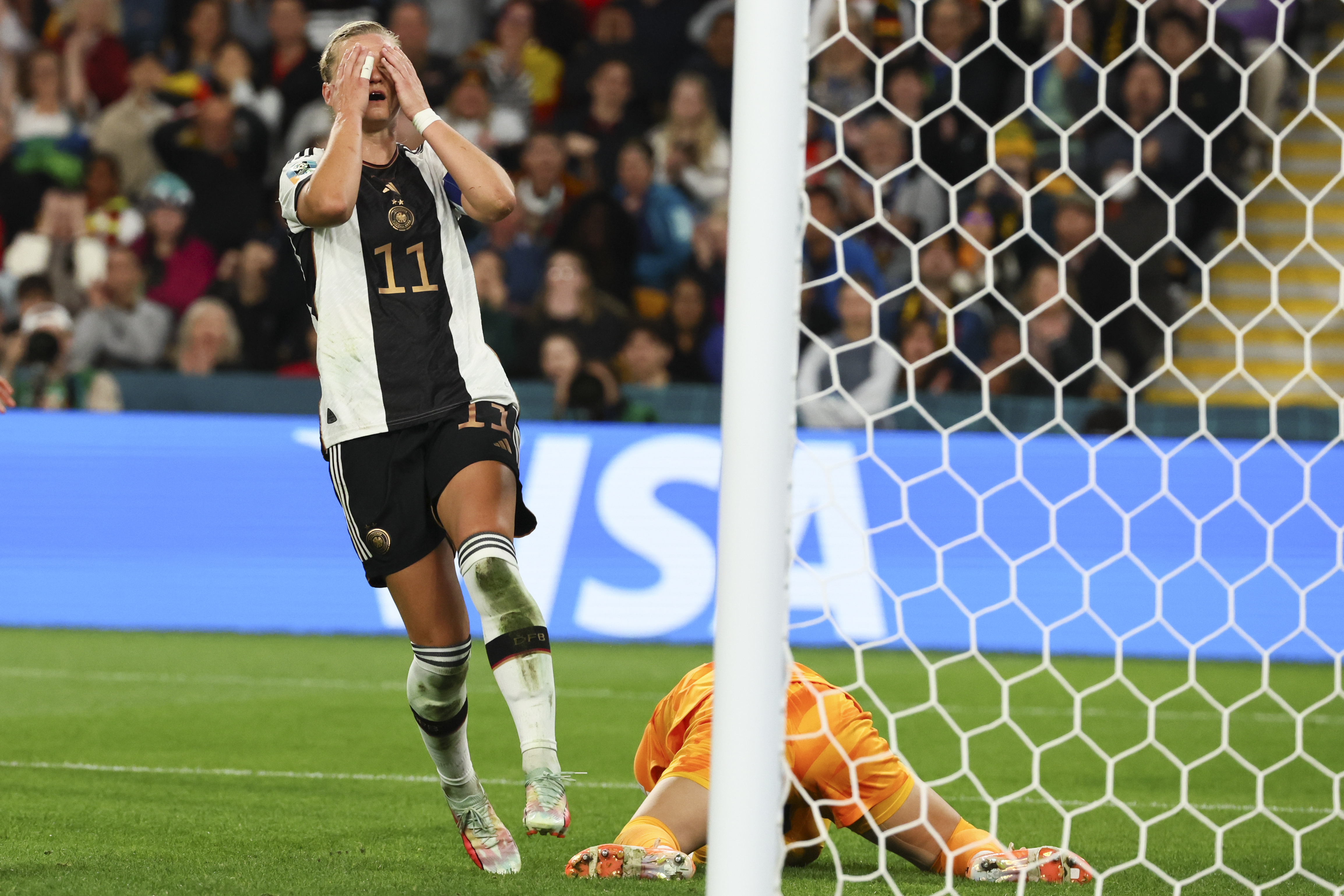 Germany's Alexandra Popp reacts after South Korea's goalkeeper Kim Jung-mi, right, saved her short at goal during the Women's World Cup Group H soccer match between South Korea and Germany in Brisbane, Australia, Thursday, Aug. 3, 2023.