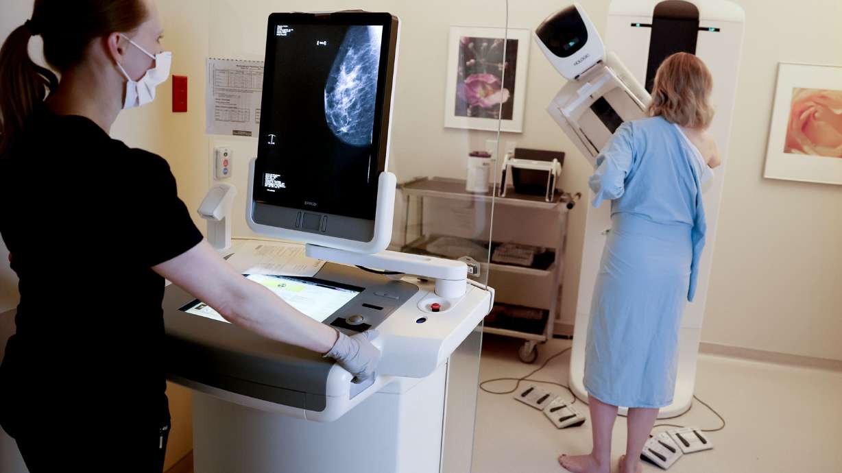 A patient gets a mammogram at the Huntsman Cancer Hospital in Salt Lake City on April 7. An ongoing Swedish study assessing the effectiveness of artificial intelligence tools in detecting early signs of breast cancer is producing results showing that computer-based scans are catching more warning signs than their human counterparts.