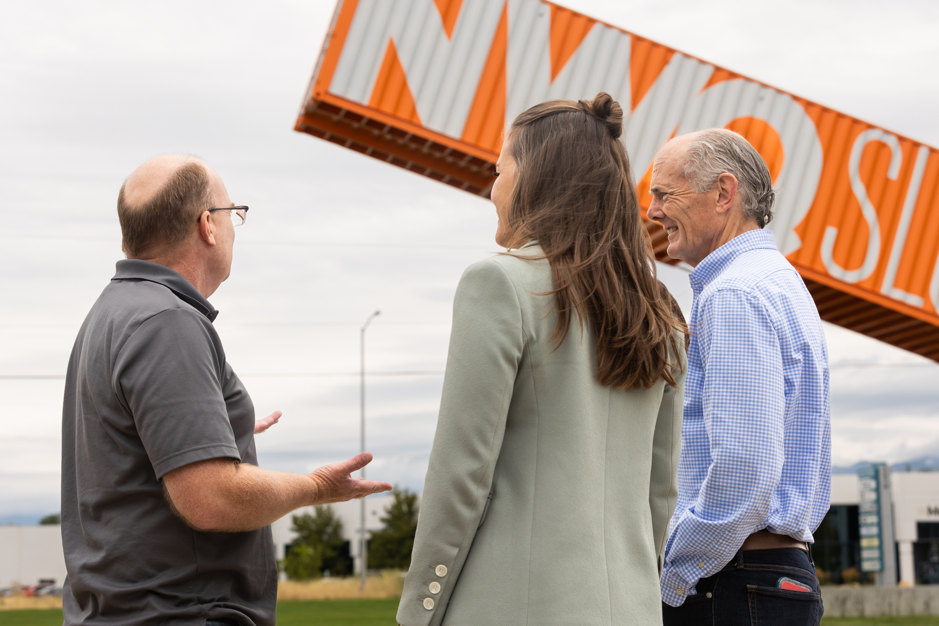 Left to right, Jerel Newsman, structural engineer, talks to Salt Lake City Mayor Erin Mendenhall and Councilman Dan Dugan at the unveiling of Salt Lake City’s newest public art piece in the Northwest Quadrant of Salt Lake City on Thursday.