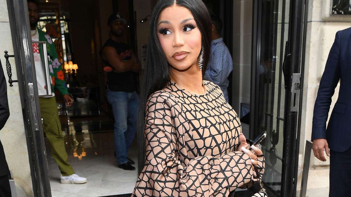 Cardi B, seen here in Paris in July, will not face charges related to throwing her microphone into the crowd at a concert in Las Vegas last weekend, according to police.