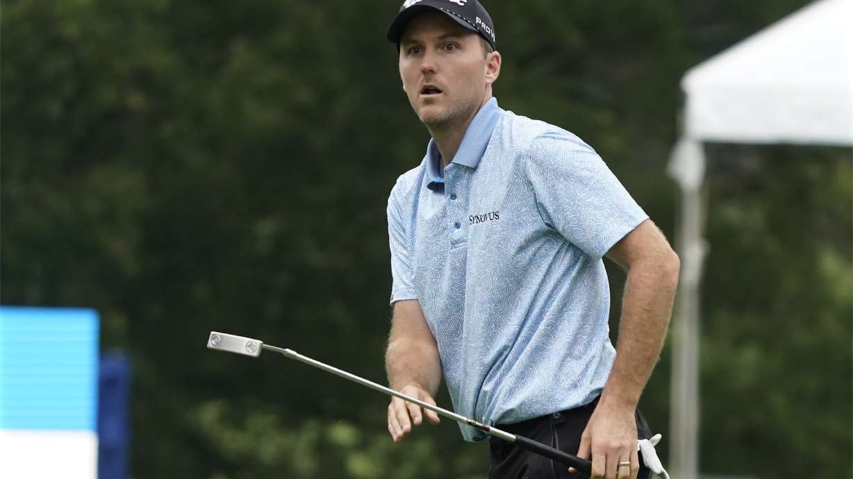 Russell Henley watches his putt on the 18th hole during the first round of the Wyndham Championship golf tournament in Greensboro, N.C., Thursday, Aug. 3, 2023.