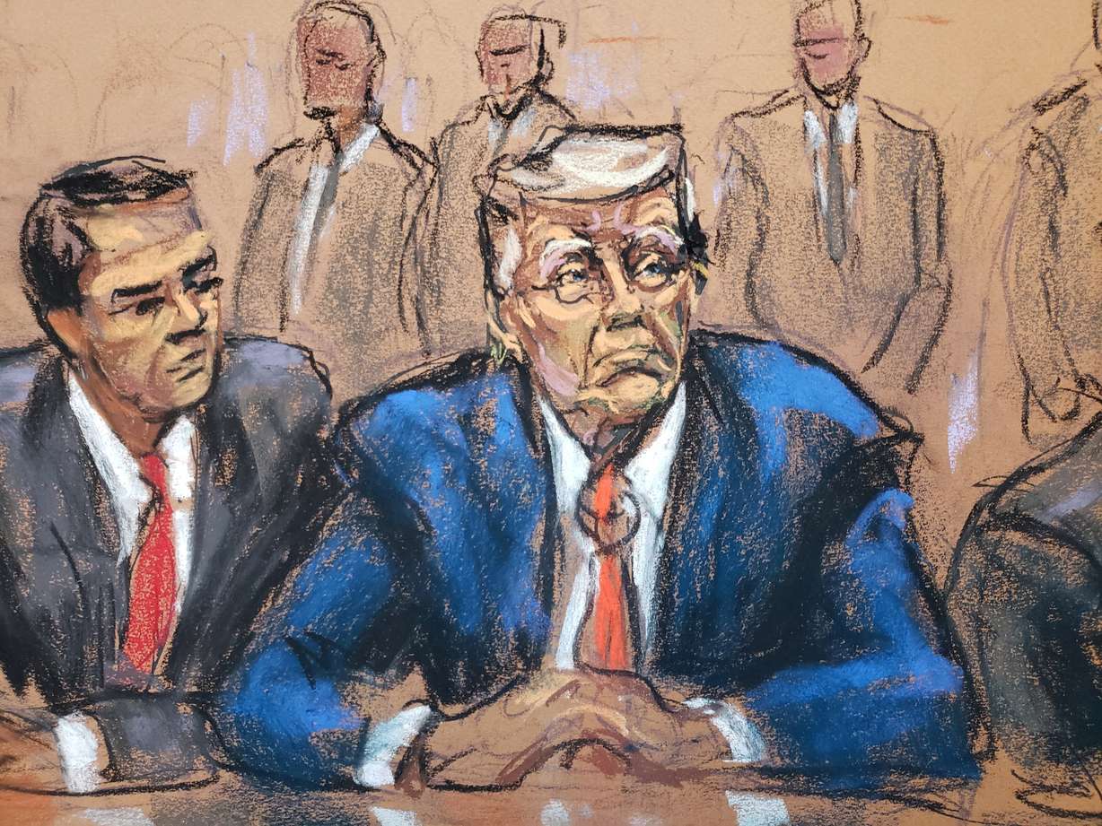 Former U.S. President Donald Trump sits next to his attorney Todd Blanche as he faces charges before Magistrate Judge Moxila A. Upadhyaya that he orchestrated a plot to try to overturn his 2020 election loss, at federal court in Washington, Thursday in a courtroom sketch.