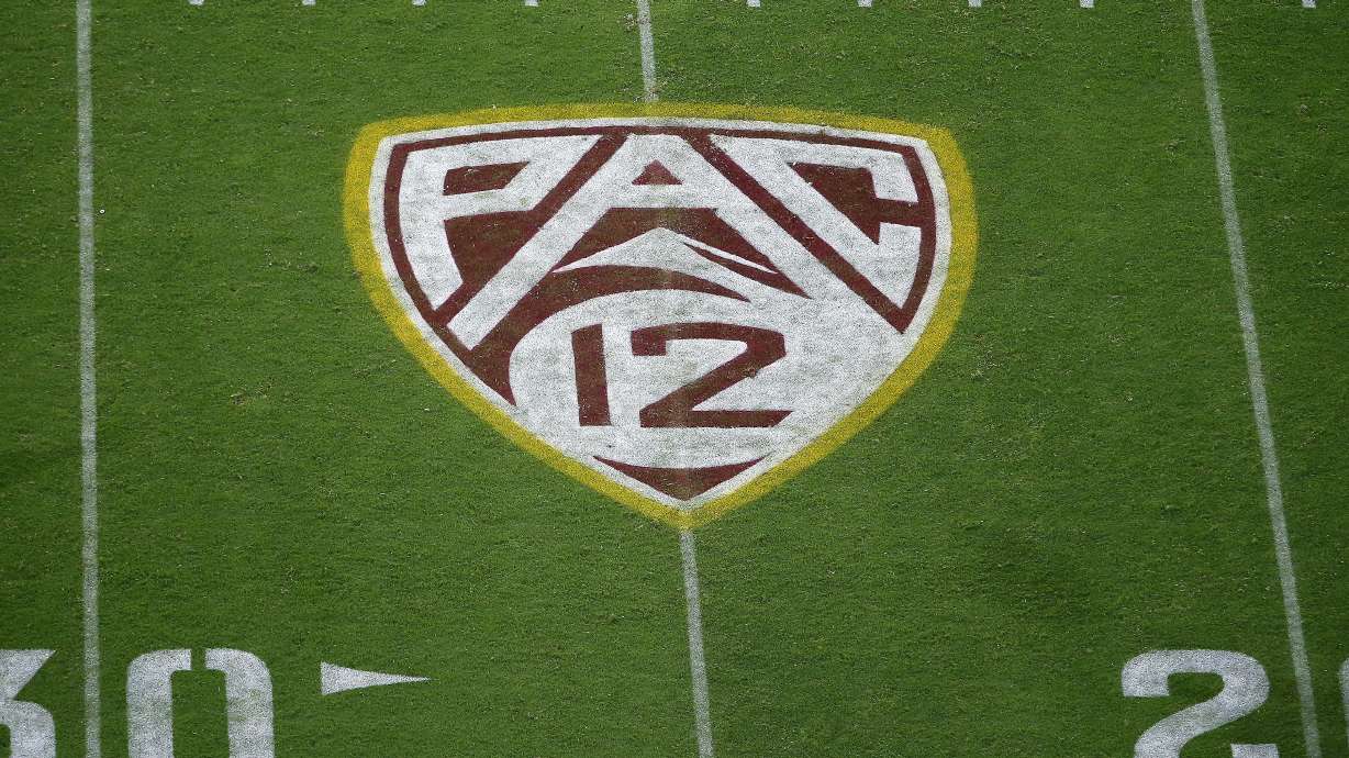 FILE - The Pac-12 logo is shown at Sun Devil Stadium during the second half of an NCAA college football game between Arizona State and Kent State in Tempe, Ariz., Aug. 29, 2019. Colorado is leaving the Pac-12 to return to the conference the Buffaloes jilted a dozen years ago, and the Big 12 celebrated the reunion with a two-word statement released through Commissioner Brett Yomark: “They’re back.”