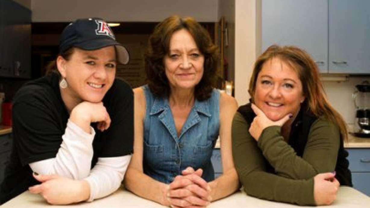 Past residents of the Women's Retreat House pose at the addiction recovery center. The Retreat House is seeking participants in their annual charity golf tournament.