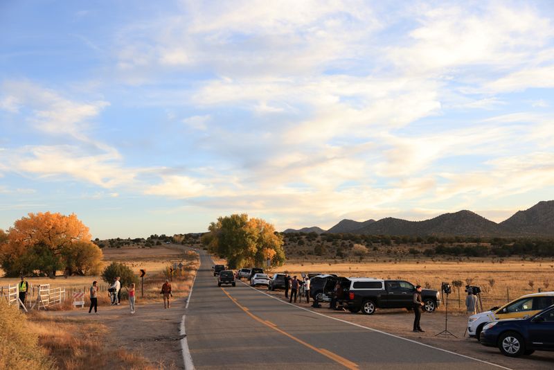 Media crews station themselves near the film set of "Rust" after Alec Baldwin fatally shot a cinematographer when he discharged a prop gun on the set in Santa Fe, N.M., Oct. 22, 2021.