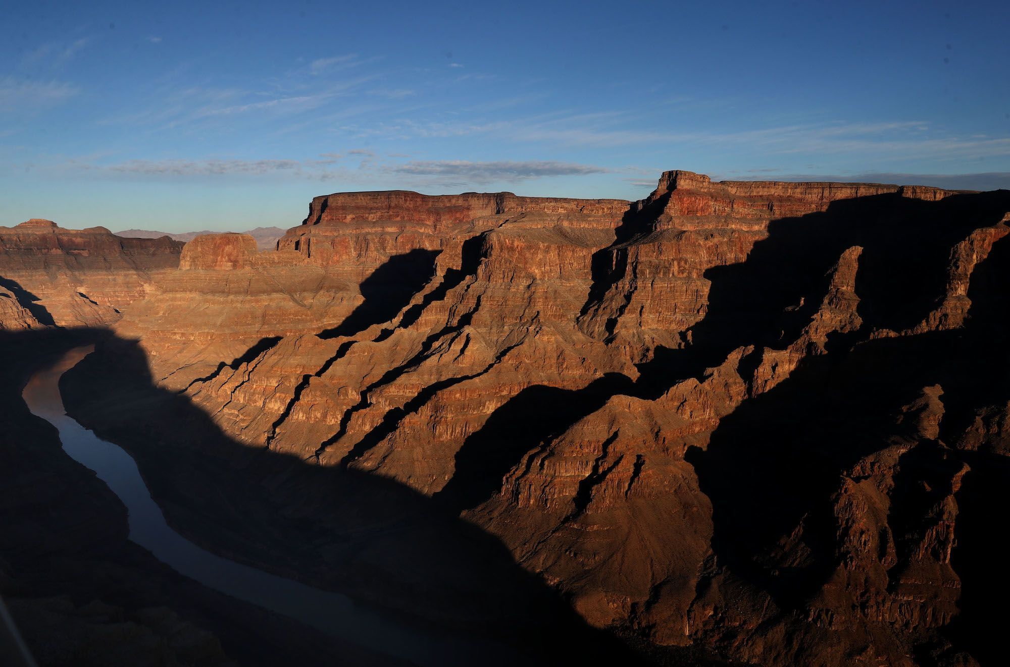 The Colorado River winds its way along the West Rim of the Grand Canyon in the Hualapai Indian Reservation on Jan. 10, 2019. President Joe Biden may declare a vast area around the Grand Canyon as the nation's newest national monument.