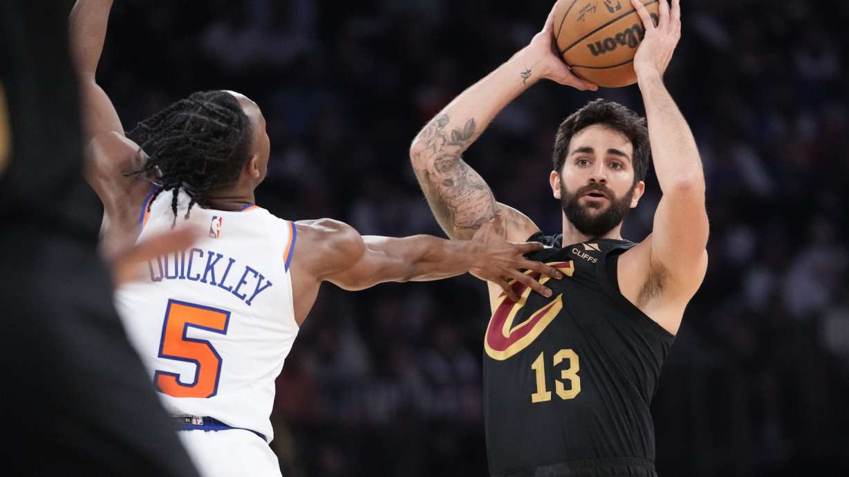 FILE - Cleveland Cavaliers guard Ricky Rubio looks to move the ball around New York Knicks guard Immanuel Quickley (5) in the first half of Game 4 in an NBA basketball first-round playoff series, April 23, 2023, at Madison Square Garden in New York. Rubio announced on Saturday, Aug. 5, that he is taking a break from basketball to focus on his mental health, a move that comes as his Spanish national team prepares to defend its title at the FIBA World Cup that starts later this month.