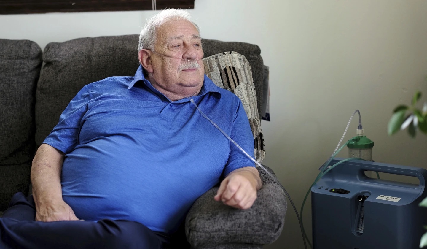 Retired coal miner James Bounds, who has pneumoconiosis, more commonly known as “black lung," sits at his home in Oak Hill, W.Va., July, 13. The federal government is looking at stricter mine regulations to prevent disease.