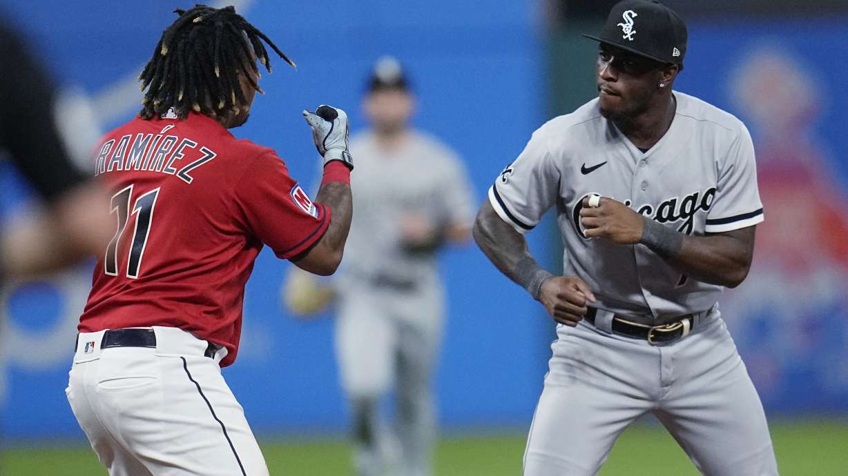 Cleveland Guardians' Jose Ramírez (11) and Chicago White Sox's Tim Anderson, right, square off during the sixth inning of a baseball game Saturday, Aug. 5, 2023, in Cleveland.