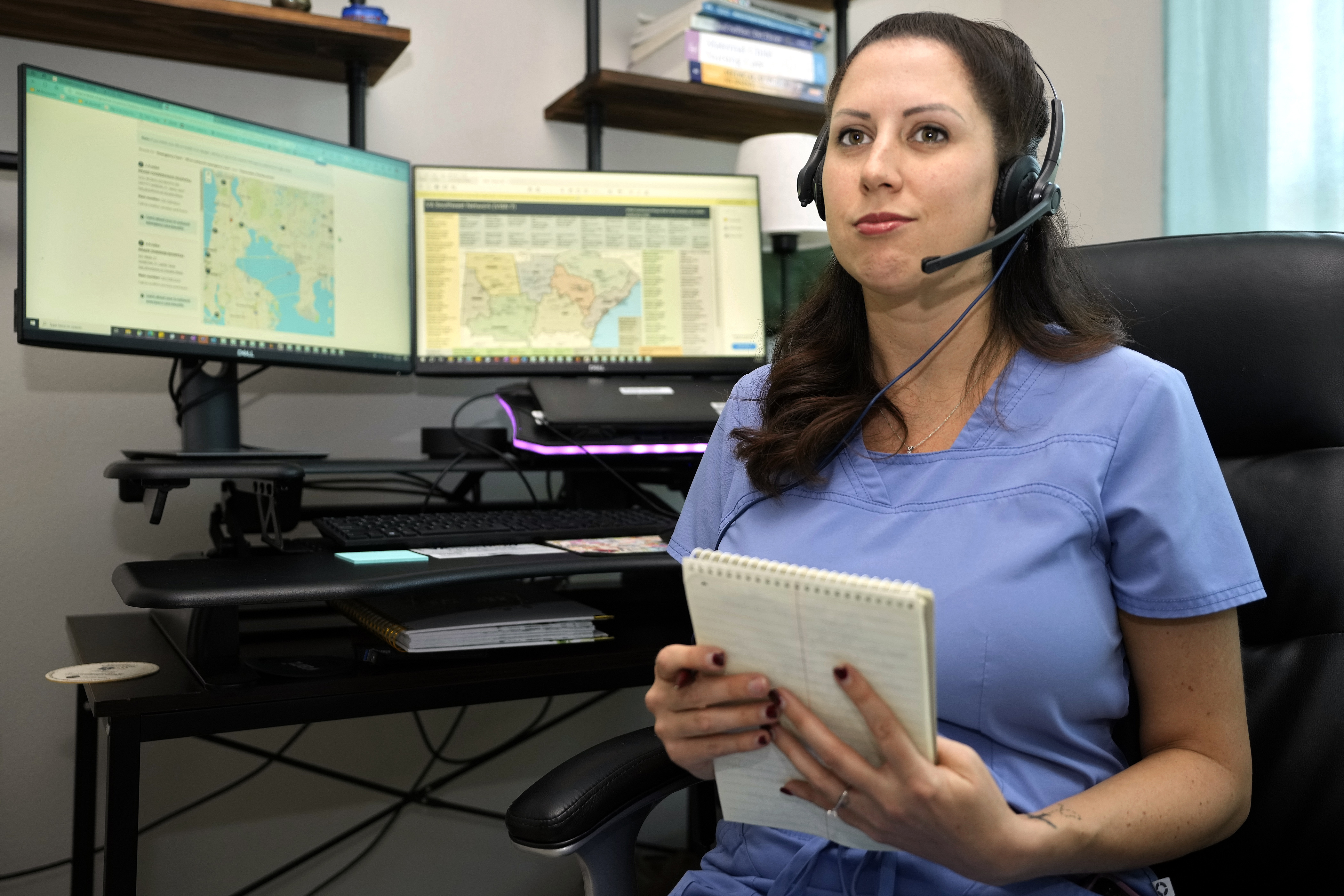 Nicole Leger works from her home office Aug. 4, in Lithia, Fla. Hundreds of thousands of veterans have received additional benefits in the past year after President Joe Biden signed legislation expanding coverage for conditions connected to burn pits. 