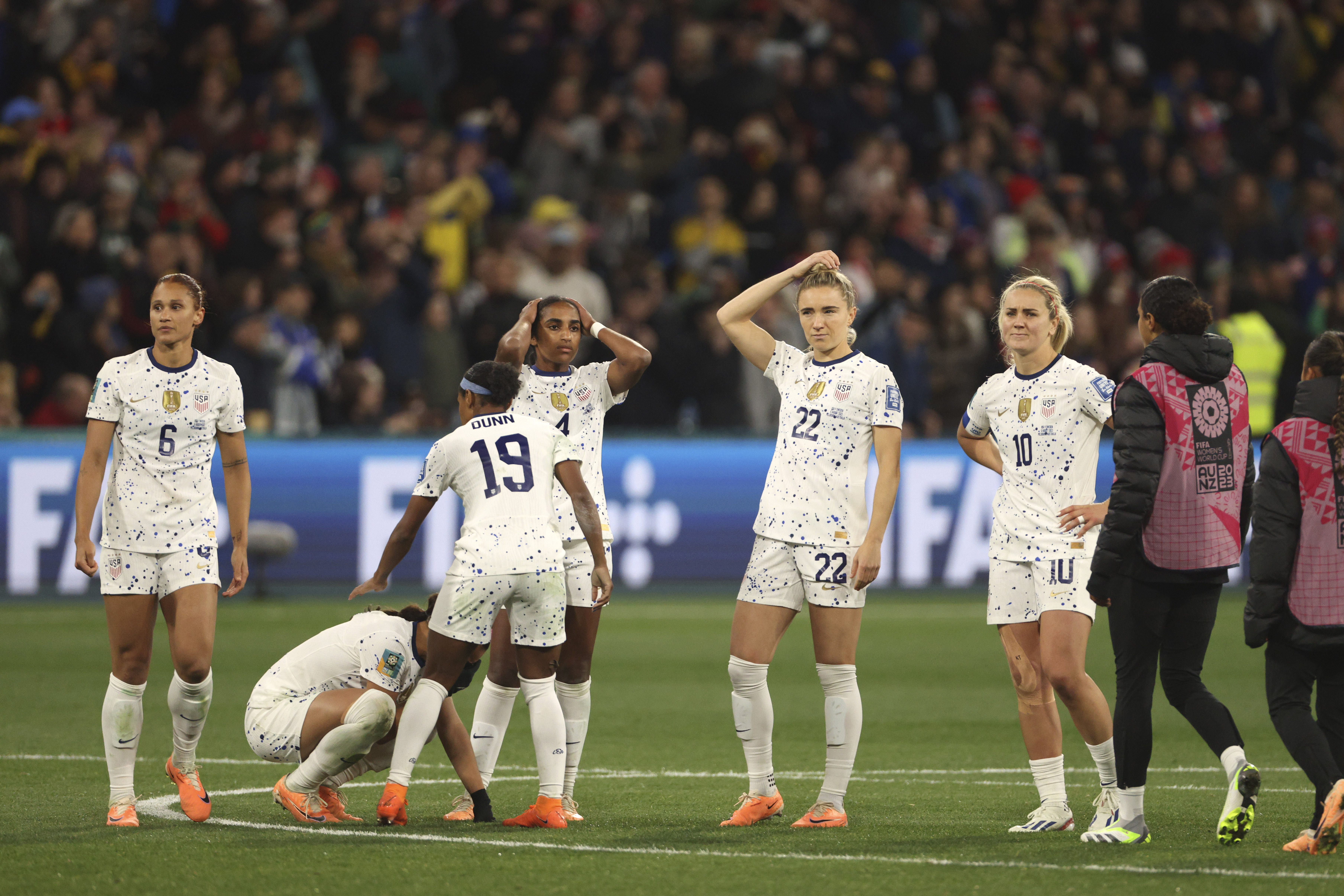 United States' players react after losing their Women's World Cup round of 16 soccer match against Sweden in a penalty shootout in Melbourne, Australia, Sunday, Aug. 6, 2023. 