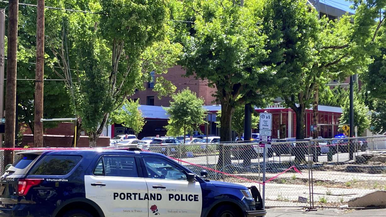 Portland Police respond to a shooting at the Legacy Good Samaritan Medical Center in Portland, Ore., July 22. Gunfire erupted in a maternity unit of the Oregon hospital over the weekend, fatally wounding an unarmed security guard and leading to renewed calls, July 24, to protect health care workers from increasing violence.