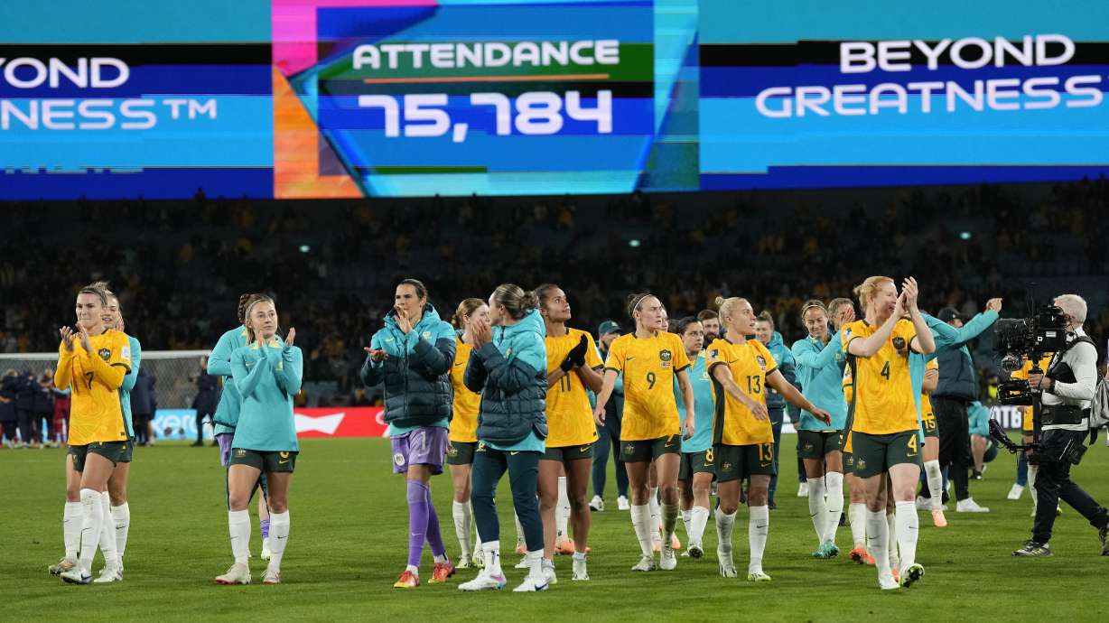 Australia's players leave the pitch after winning the Women's World Cup round of 16 soccer match between Australia and Denmark at Stadium Australia in Sydney, Australia, Monday, Aug. 7, 2023.