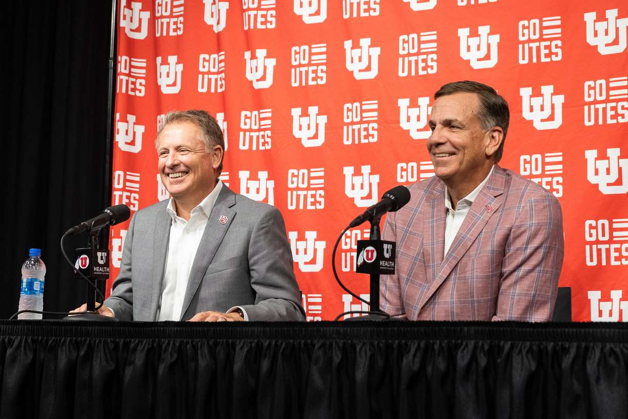 University of Utah President Taylor Randall, left, and athletic director Mark Harlan speak at a press conference regarding Utah’s move to the Big 12 Conference at Rice-Eccles Stadium in Salt Lake City on Monday, Aug. 7, 2023.