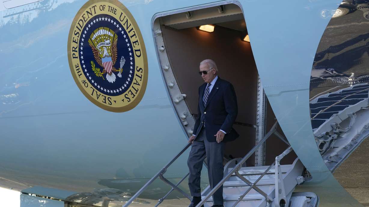 President Joe Biden arrives on Air Force One at Grand Canyon National Park Airport on Monday in Grand Canyon Village, Ariz. Biden is set to visit Utah Wednesday and Thursday.