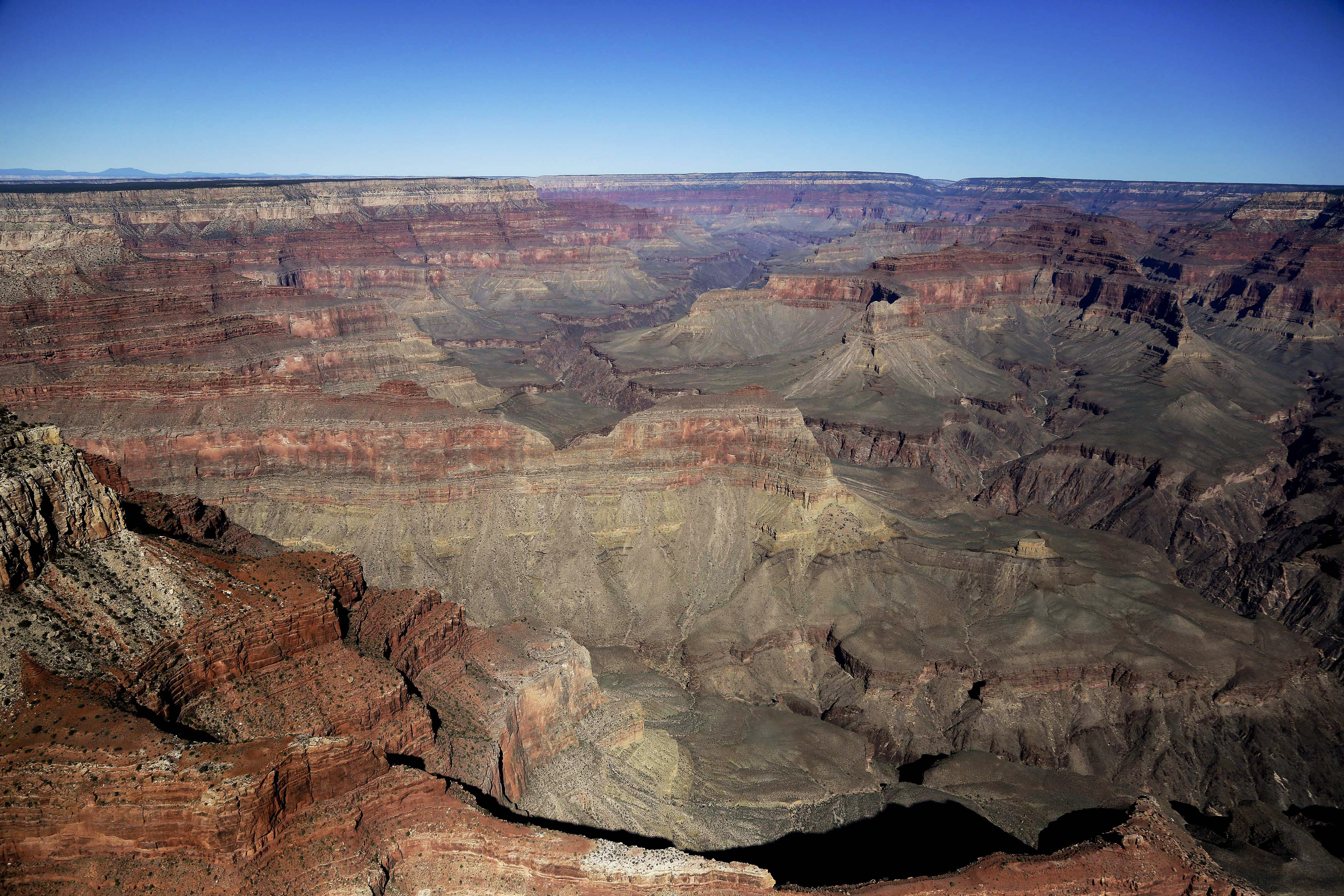 The Grand Canyon National Park is covered in the morning sunlight as seen from a helicopter near Tusayan, Ariz., Oct. 5, 2013. President Joe Biden has signed a national monument designation for the greater Grand Canyon, declaring it good "not only for Arizona but for the planet."