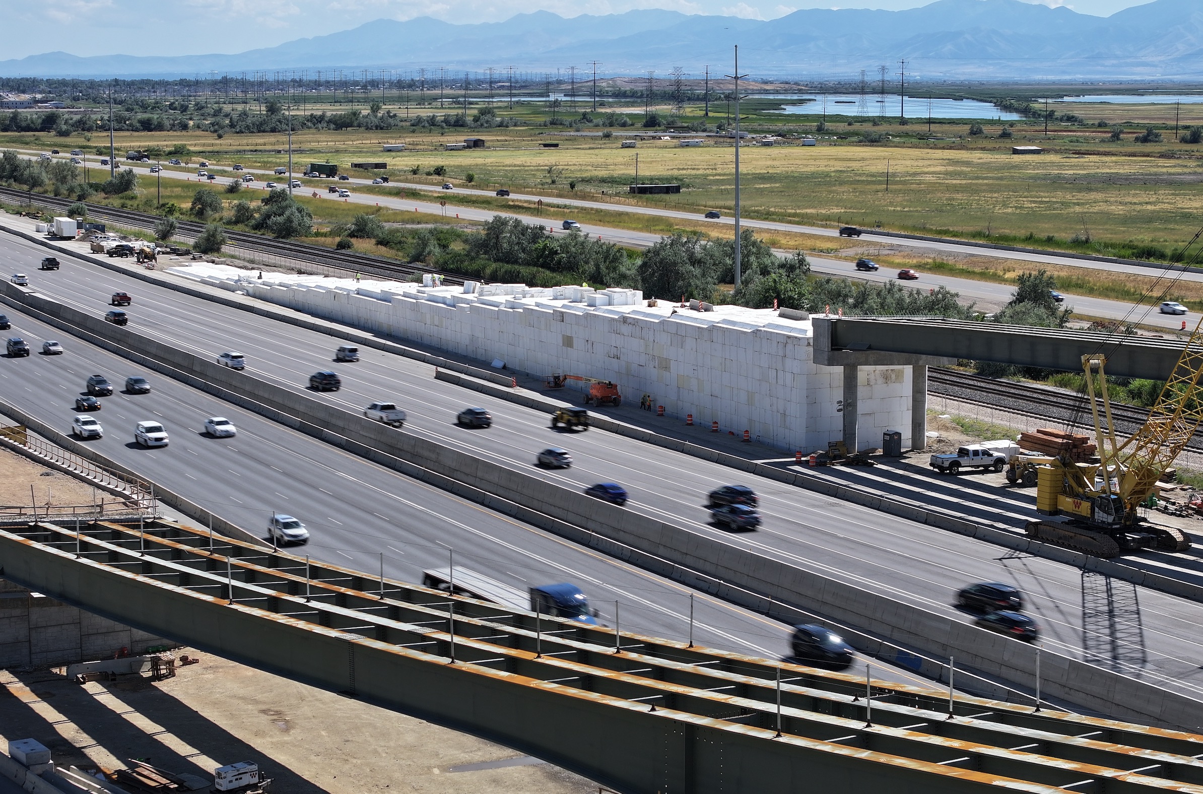 Officials say thousands of plastic foam blocks were stacked to form the base of a new I-15 on-ramp as part of the West Davis Highway bridge construction in Farmington.