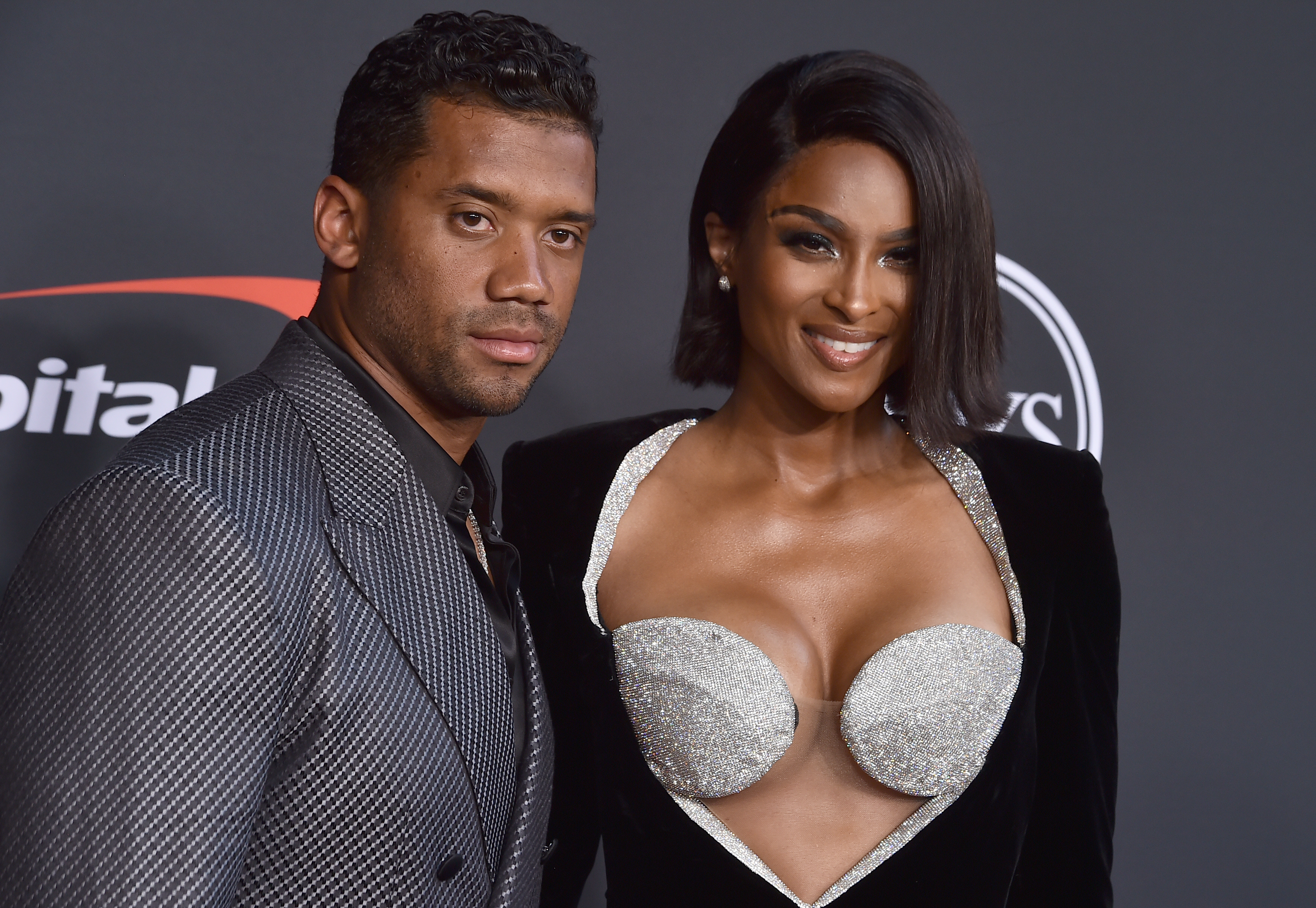 FILE - NFL player Russell Wilson of the Denver Broncos, left, and Ciara arrive at the ESPY Awards on Wednesday, July 20, 2022, at the Dolby Theatre in Los Angeles. The Grammy-award winning performer Ciara is expecting her fourth child, her third with husband and Denver Broncos quarterback Russell Wilson.