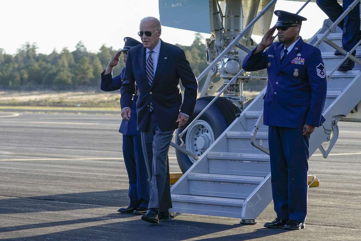President Joe Biden arrives on Air Force One at Grand Canyon National Park Airport, Monday.