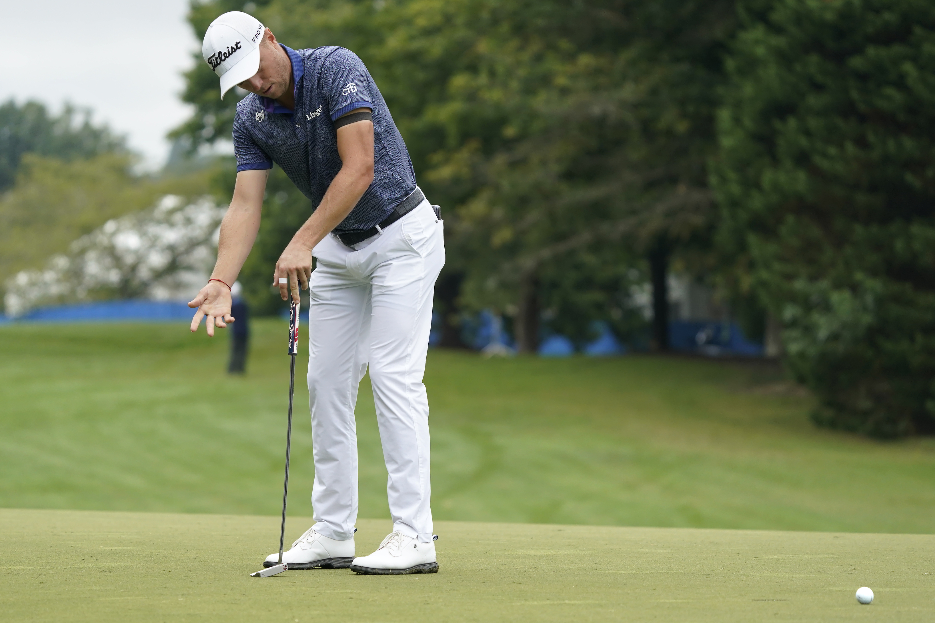Justin Thomas reacts to missing a birdie putt on the first hole during the second round of the Wyndham Championship golf tournament in Greensboro, N.C., Friday, Aug. 4, 2023.