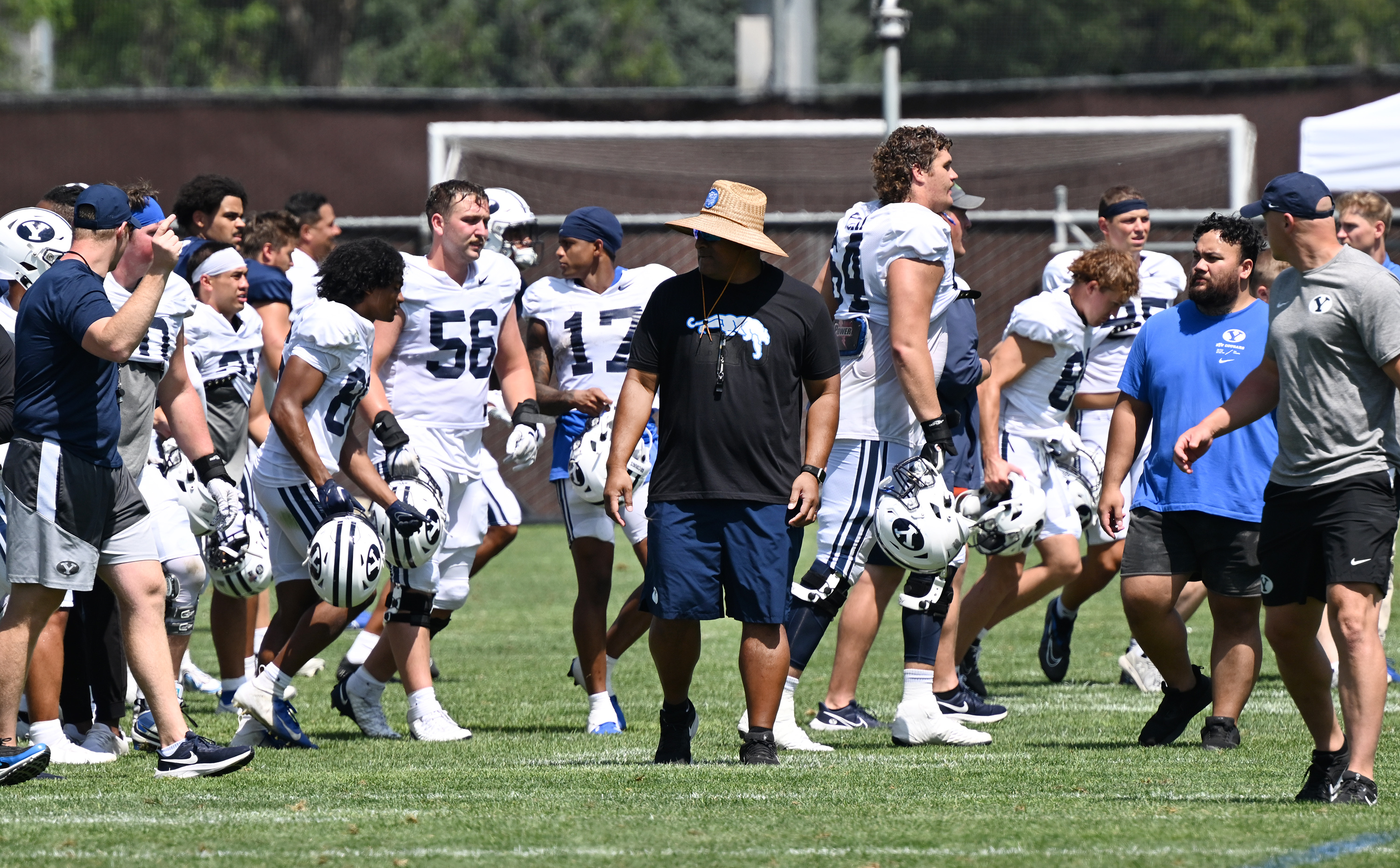 BYU Cougars football coach Kalani Sitake looks around as he walks off the field following practice in Provo on Tuesday, Aug. 8, 2023.