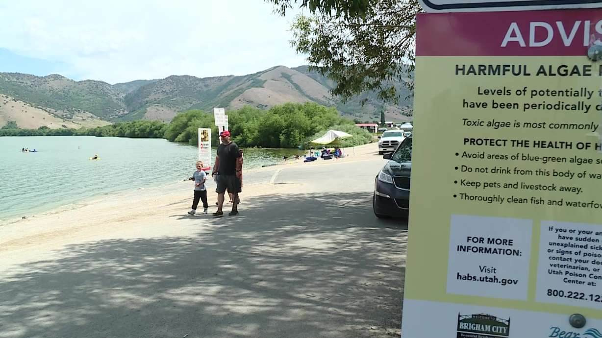 A sign at Mantua Reservoir in Box Elder County warns of a potentially harmful algal bloom on Tuesday.