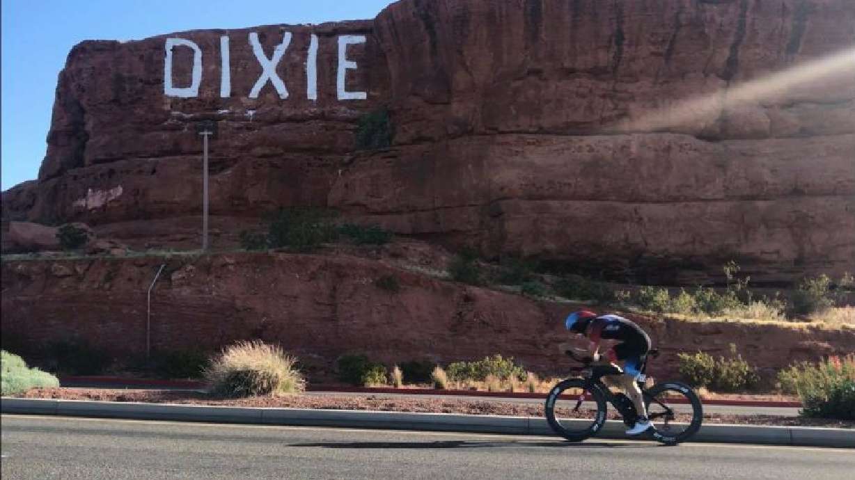 An athlete biking near the Sugarloaf, aka the Dixie Rock, in St. George, May 4, 2019. Sugarloaf has been recognized as a landmark on the National Park Service’s National Register of Historic Places.