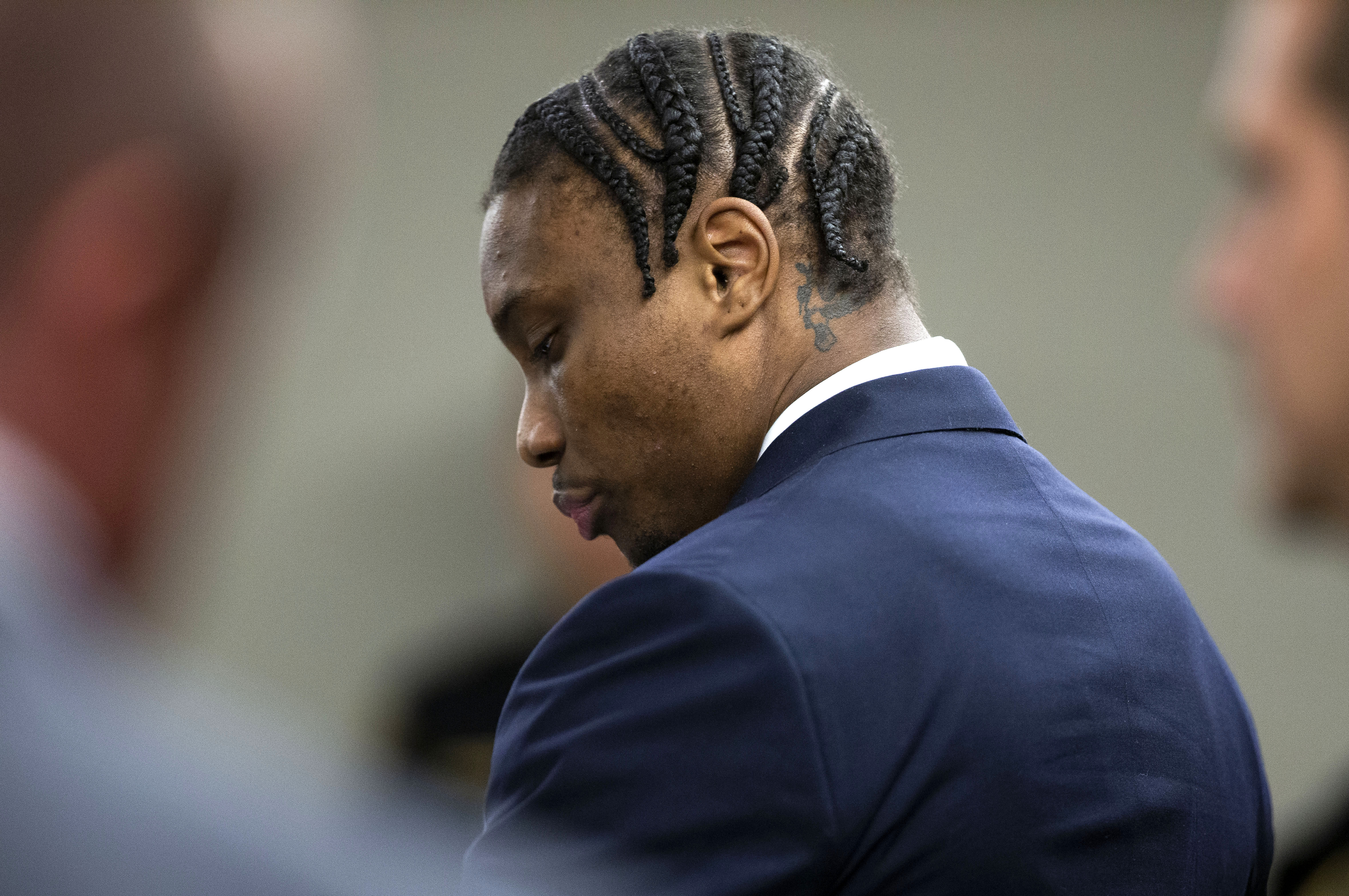 Former Las Vegas Raiders NFL football player Henry Ruggs III stands in the courtroom during his sentencing hearing at the Regional Justice Center, Wednesday, Aug. 9, 2023, in Las Vegas. Ruggs pleaded guilty May to felony DUI causing death and misdemeanor vehicular manslaughter. 