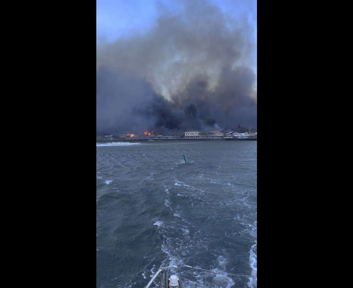 Smoke fills the air from wildfires at Lahaina harbor on Tuesday in Hawaii. Fire was widespread in Lahaina Town, including on Front Street, a popular shopping and dining area, County of Maui spokesperson Mahina Martin said by phone early Wednesday.