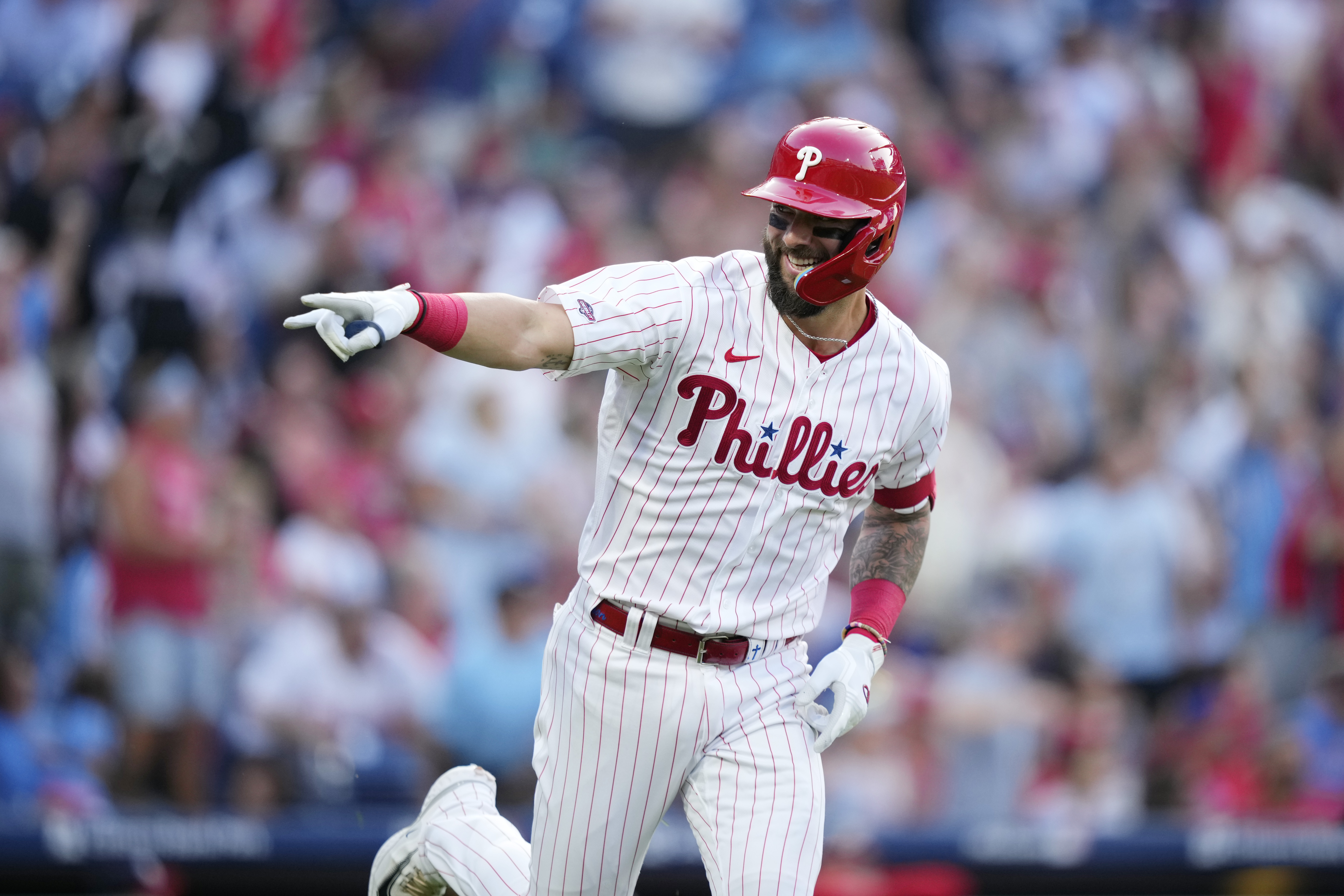 Philadelphia Phillies' Weston Wilson reacts after hitting a home run against Washington Nationals pitcher MacKenzie Gore during the second inning of a baseball game, Wednesday, Aug. 9, 2023, in Philadelphia.