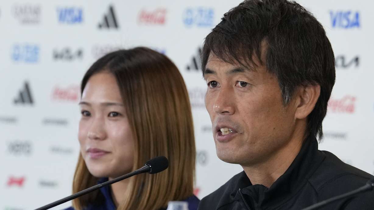 Japan's head coach Futoshi Ikeda, right, speaks to the media during a press conference with Japan's Fuka Nagano ahead of the FIFA Women's World Cup quarterfinal soccer match between Japan and Sweden in Auckland, New Zealand, Thursday, Aug. 10, 2023.