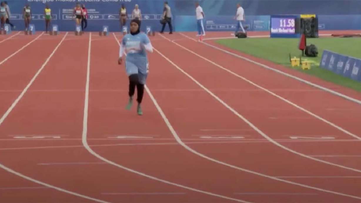 Somalian Nasra Abukar Ali took more than 21 seconds to complete the 100-meter race at the World University Games, finishing last and more than 10 seconds behind the winner.