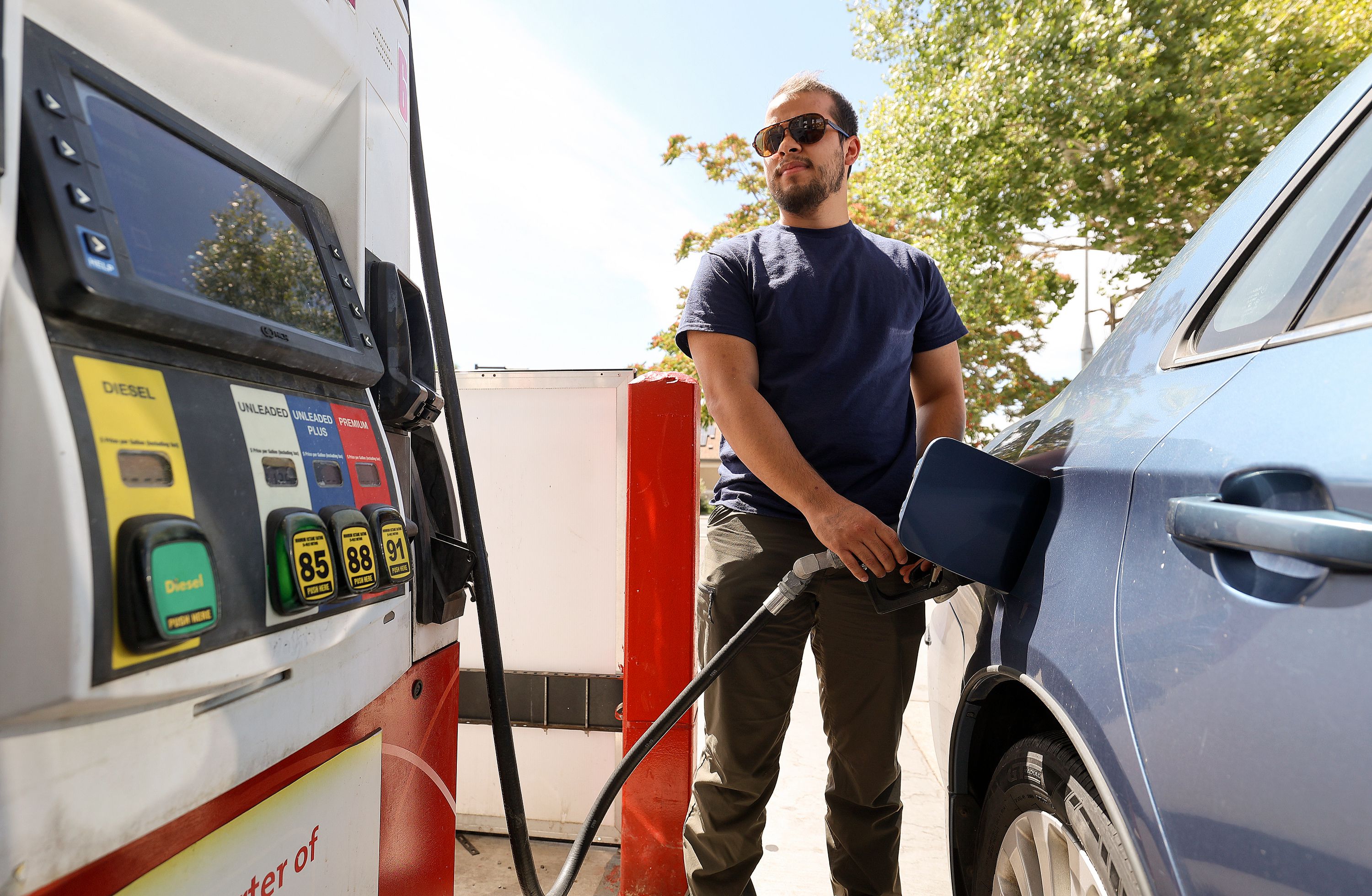 Noah Funtanilla gets gas at Speedway in Salt Lake City on Monday. Declines in U.S. annual inflation rates had been on a 12-month streak before inching up 0.2% from June to July, according to a Labor Department report released on Thursday.