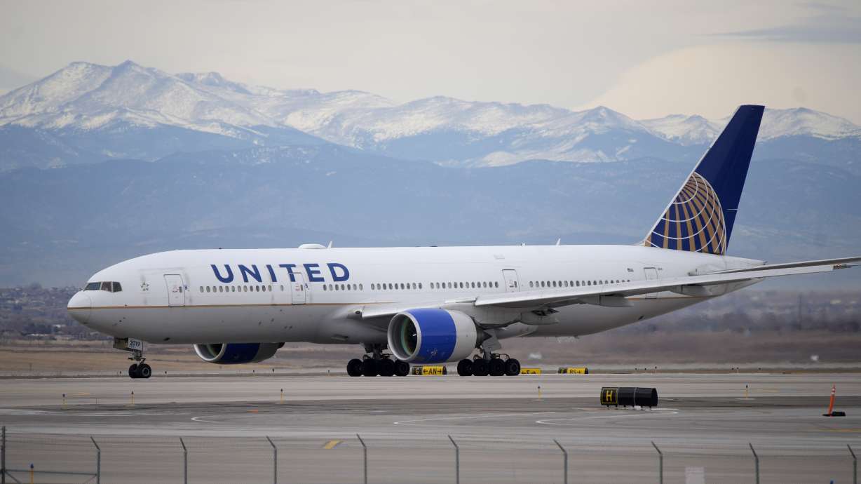 A United Airlines jetliner taxis to a runway for take off from Denver International Airport, Dec. 27, 2022. Federal investigators said Thursday that miscommunication between pilots led to a United Airlines plane diving within 748 feet of the ocean’s surface shortly after takeoff from Maui in December.