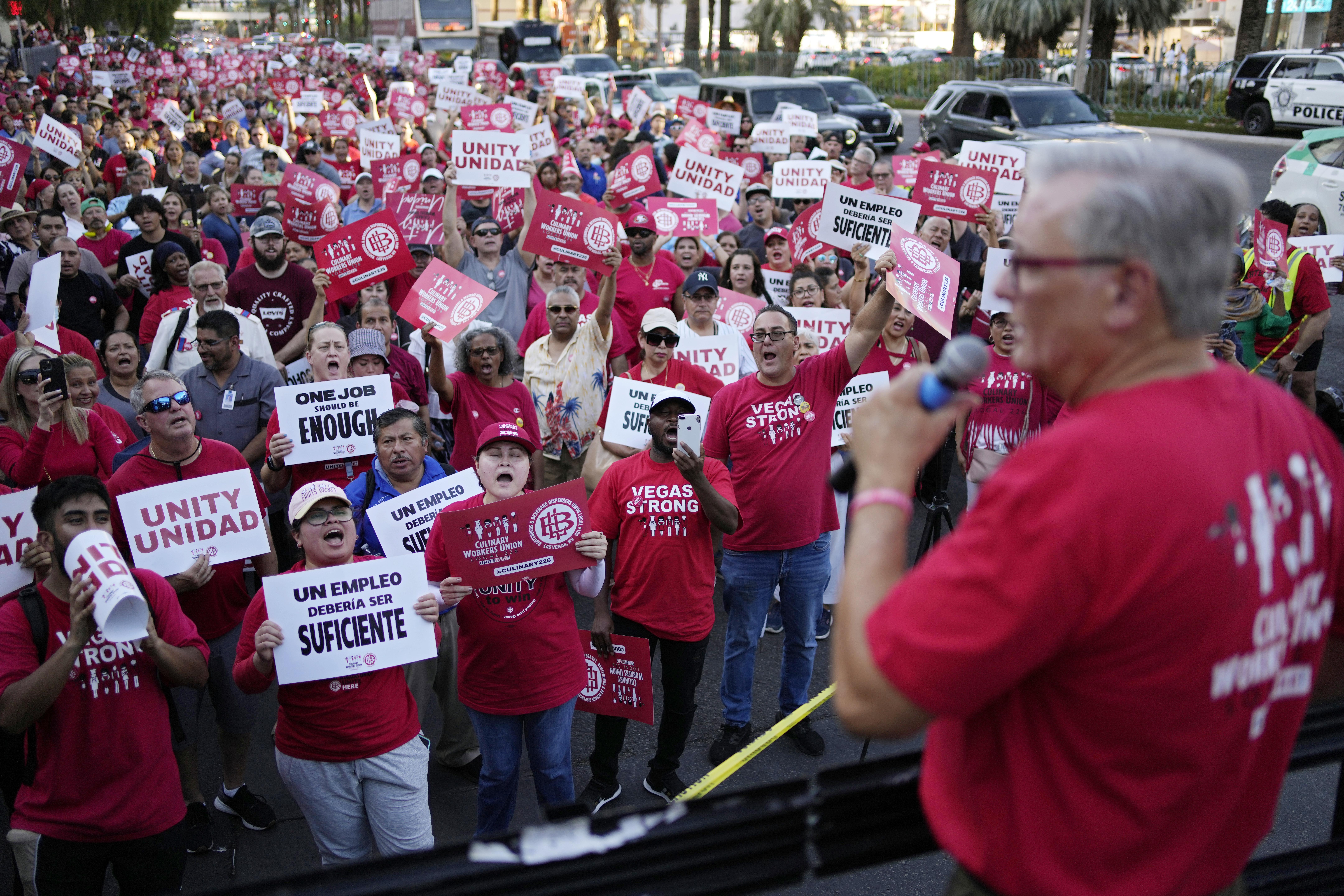 Members of the Culinary Workers Union cheer as Secretary-Treasurer Ted Pappageorge speaks during a rally along the Las Vegas Strip on Thursday in Las Vegas.